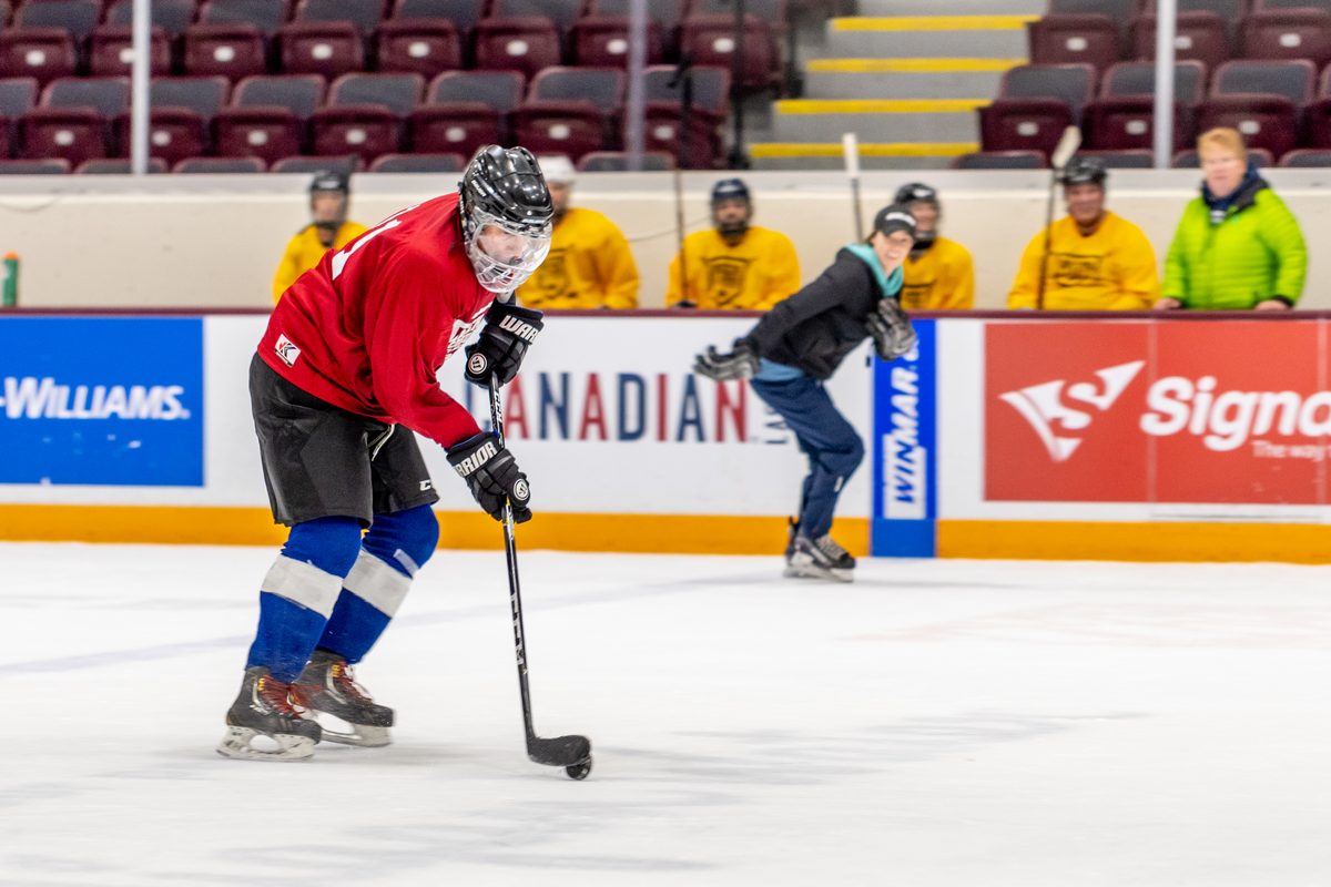 Players on the ice during a league night